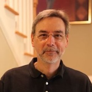 Photo of a man wearing glasses