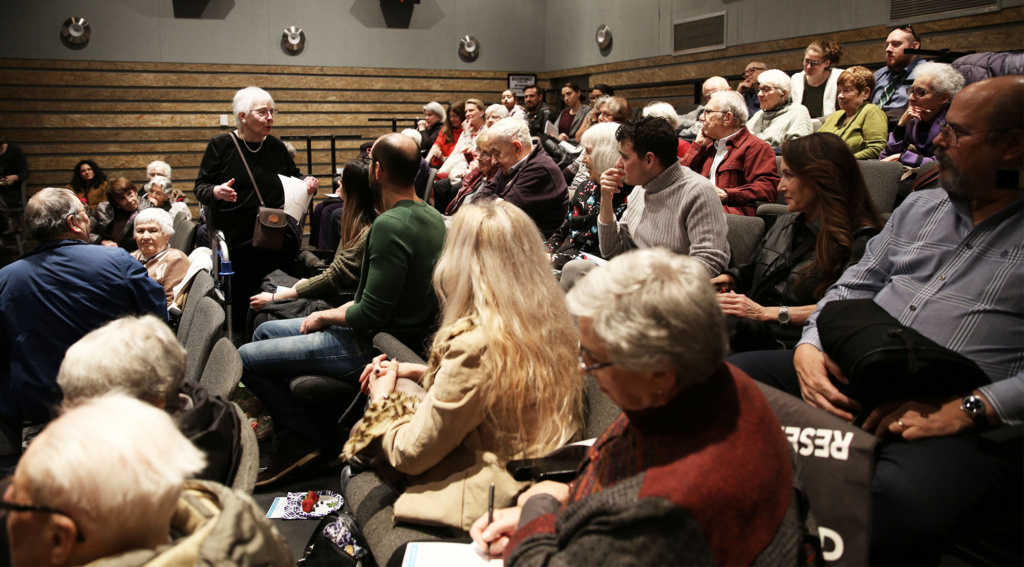 Participant, Adele Schneider, 95, discusses her short film with audience members.