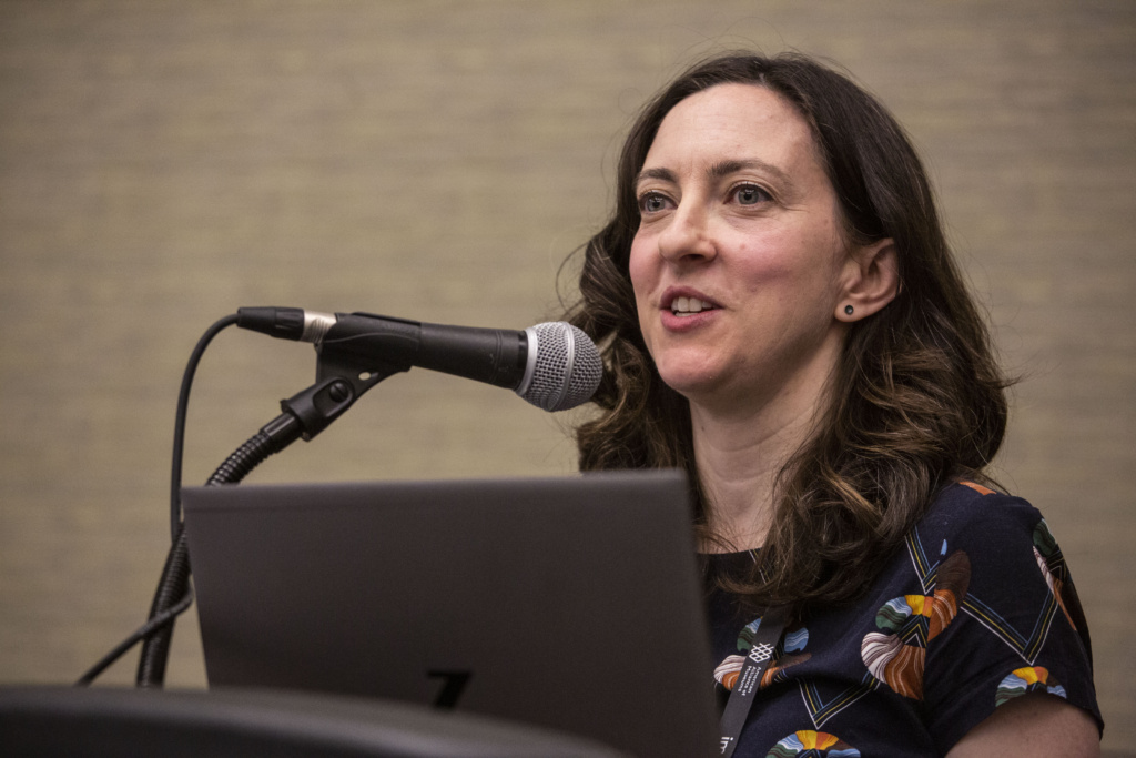 Julie Kline speaking at the podium at AAM Boston 2022